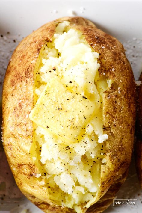 The perfect baked potato recipe for crispy, golden skin and a fluffy, tender inside. Learn how to make the best baked potatoes every time! // addapinch.com Best Baked Potatoes, Baked Potato Salad Recipe, Baked Potato Recipe, Baked Potato Toppings, Cooking Baked Potatoes, Best Baked Potato, Golden Skin, Perfect Baked Potato, Making Baked Potatoes