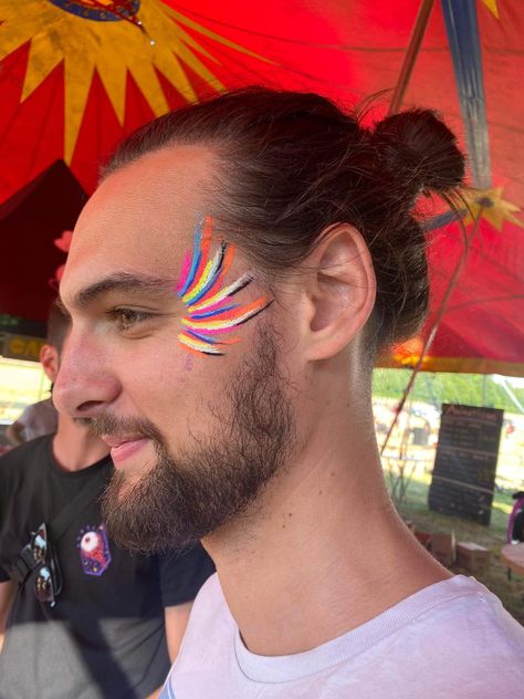 Simple Festival Face Paint, Face Painting Cochella, Facial Makeup Art, Uv Festival Makeup, Mens Festival Makeup, Pride Body Painting, Festival Makeup For Men, Easy Neon Face Paint Ideas, Music Festival Face Paint