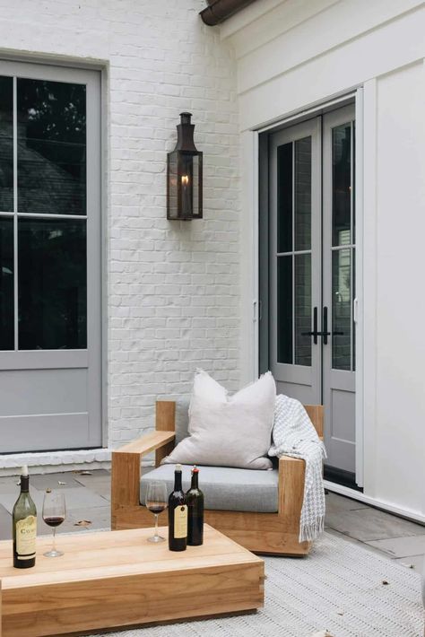 Patio Pizzazz: Small Garden Layouts and Backyard Inspirations White Brick And Siding House, White Brick Gray Trim, Grey Trim Exterior House, Renovated Brick House, Painted Gray Brick House Exterior, Modern White Brick House, Equestrian Kitchen, Painted White Brick House, White Ranch House