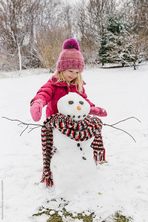 Snowman and Child by Raymond Forbes LLC - Child, Snowman - Stocksy United Snowman Real, Kids Playing In Snow, Winter Photography Nature, Winter Child, Action Board, Books Pictures, Snow Images, Snow Time, Snow Sculptures