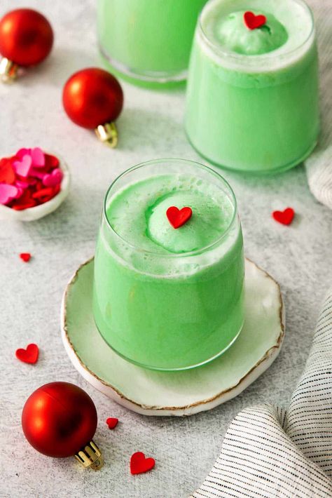 Festive green Grinch Punch is a fruity, creamy easy Christmas punch recipe inspired by the Grinch who stole Christmas! Non-alcoholic punch. Easy Christmas Punch, Green Punch Recipes, Fun Holiday Drinks, Grinch Punch, The Grinch Who Stole Christmas, Sugar Cookie Icing Recipe, Grinch Cake, Favorite Christmas Desserts, Frozen Limeade