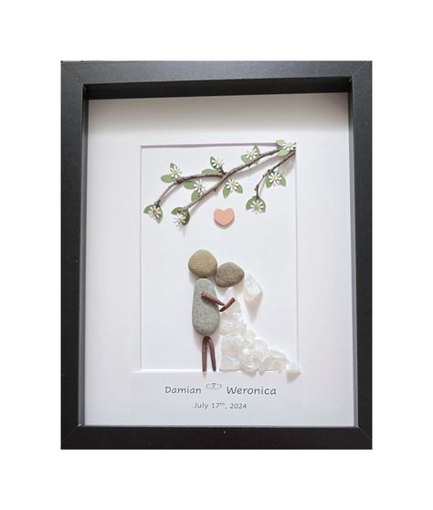 One of-kind Bride and Groom Personalized Pebble Art, Rocks Wedding Anniversary gift, with a tree branch and handmade leaves and white flowers ❤️ Bride and Groom Personalized Wedding Art in 9x11frame with tree Braches and flowers, Rock Art Wedding, Pebble Art Wedding Gift, WHITE or BLACK Frame available 🌳This Unique Couple portrait is made in approximately 9x11 frame size, and it's protected by glass  🌳Excellent present for outdoors and nature loving couple or family as an: Engagement Gift Wedd Pebble Art Wedding Couple, Wedding Rock Art, Wedding Pebble Art, Wedding String Art, Pebble Art Wedding, Stone Pictures Pebble Art, Art Wedding Gift, Flowers Bride, Wedding Gifts For Bride And Groom