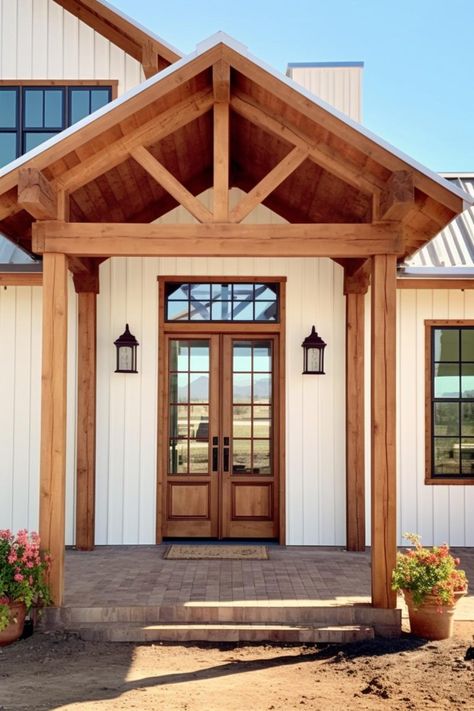 40 Farmhouse Porch Columns To Achieve a Rustic Entryway! Front Porch With Corbels, Farmhouse Chimney Exterior, House Post Ideas, Entryway Porch, Craftsman Front Porch Addition, Gabled Porch, Front Gable Porch Entrance, Add On Porch To Front Of House, Arch Entryway Exterior Porches