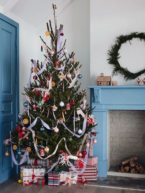 Tree-Decorating Inspiration from IKEA's Holiday Catalog | domino Ikea Christmas Decorations, Ikea Christmas Tree, Ikea Christmas, Gingerbread House Kits, Ikea Catalog, Paper Streamers, Christmas Tree Decor, Holiday Catalog, Scandinavian Christmas