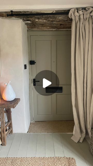 Interior Designer - Bee Osborn on Instagram: "Moody simplicity at the cottage with an old reclaimed door and a linen curtain…. not glamorous, just very simple and real… Front door and floor paint: Algy’s Patch @fenwickandtilbrook Door furniture: @fromtheanvil Door mat: we cut from an old rug (don’t laugh but it’s true) Curtain : bespoke linen #frontdoor #frontdoordecor #entrance #hall #hallwaydecor #hallway #entrancehall #entrancehallstyling #countrystyle #rusticdecor #rustichome #cottageren Hallway Front Door Curtain, Curtains Hallway, Linen Door Curtain, Cottage Interior Doors, Hall Curtains, Front Door Curtains, Victorian Door, Doors And Floors, Cottage Renovation