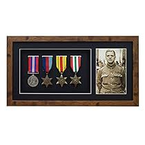 Army Medal Display Ideas, How To Display Medals, Military Shadow Box Ideas, Picture Arrangements On Wall, Medal Displays, Military Shadow Box, Military Awards, Flag Display Case, Picture Arrangements