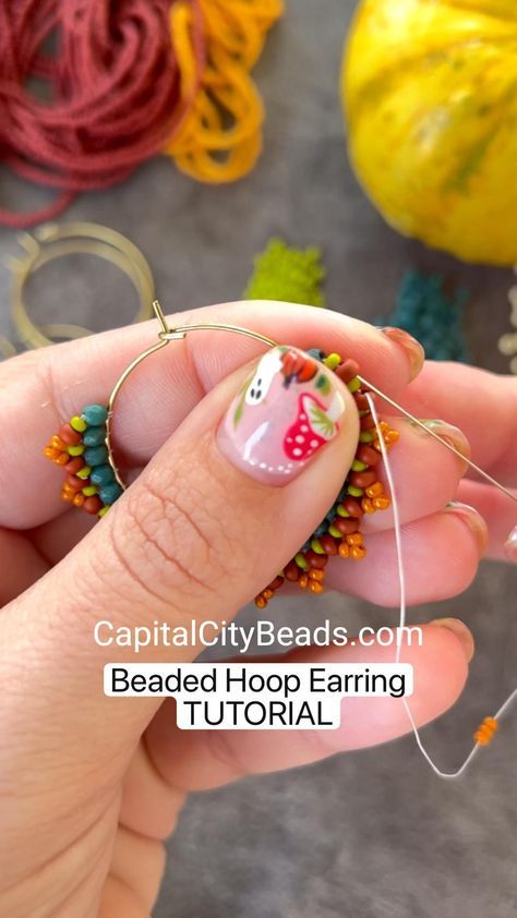 Beaded Hoop Earrings, DIY Jewelry Making tutorial. Brick Stitch Seed Bead Design by CapitalCityBeads Hoop Earring Tutorial, Beaded Hoop Earring, Hoop Earrings Diy, Jewelry Making Tutorial, Diy Jewelry Making Tutorials, Diy Seed Bead Earrings, Seed Bead Jewelry Patterns, Beaded Jewelry Earrings, Beaded Earrings Tutorials