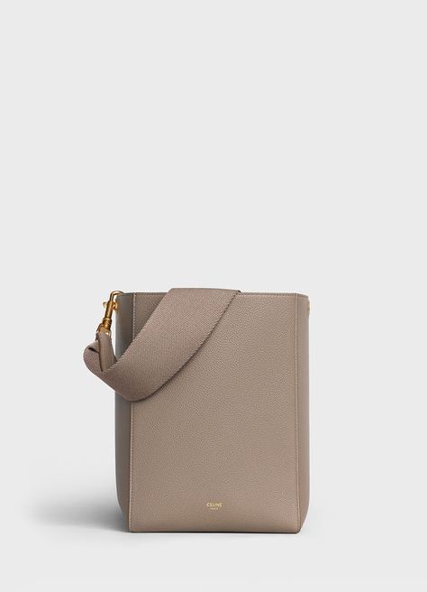 Sangle Small Bucket bag in soft grained calfskin Celine Bucket Bag, Celine Belt, Minimal Bags, Stylish Leather Bags, Celine Fashion, Small Bucket Bag, Canvas Bag Design, Wedding Saree Collection, Small Buckets