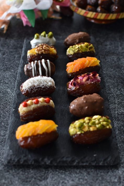 Candied Dates Recipe, Ramadan Dates Ideas, Healthy Treats With Dates, Stuffed Medjool Dates, Stuffed Medjool Date Recipes, Chocolate Dipped Dates, Dates With Chocolate, Stuffed Dates Dessert, Medjool Date Recipes Desserts