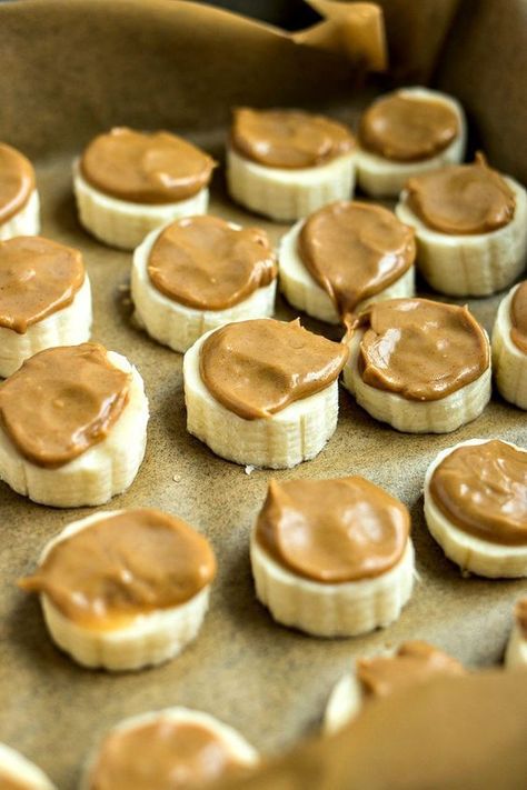 10 Late Night Snacks That You Won’t Feel Guilty After Eating Frozen Banana And Peanut Butter, Peanut Butter And Bananas, Banana Slices With Peanut Butter, Banana Peanut Butter Snack, Frozen Peanut Butter Banana Bites, Banana Peanut Butter Frozen Treats, Healthy Snacks Peanut Butter, Banana And Peanut Butter Snack, Snacks With Peanut Butter