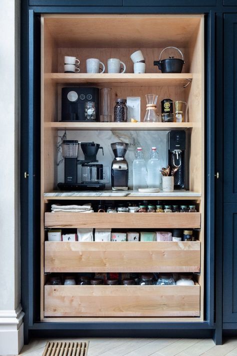 5 Kitchen Coffee Station Ideas to Optimize Your Caffeine Routine | LOTS OF STORAGE INSIDE POCKET DOORS | It’s the little details like this one has that make designing a coffee station for yourself exciting. Kaffe Station, Desain Pantry Dapur, Organiser Cucina, Coffee Station Kitchen, Tea Station, Bar In Casa, Desain Pantry, Kabinet Dapur, Home Coffee Stations