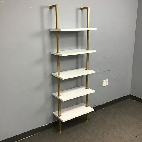 Modern, clean lines, and a touch of glam ✨ These wall mounted shelves are ready to display your favorite books and bobbles! Contemporary White Laminate & Gold Metal 5-Tier Wall-Mounted Ladder Shelf [$120 New!] (24”W x 12”D x 73”H) Item Number: 16368-7 $80 Love it? Don’t miss out! You can purchase this item on our website (link in bio). Pro Tip: use the Item Number listed above to search for this exact product. Or come by our new store location anytime at 401 Elmira Road! We always love t... Thrift Shop Finds, Love The Earth, Mounted Shelves, Ladder Shelf, White Laminate, Pro Tip, Reduce Reuse, Wall Mounted Shelves, Website Link