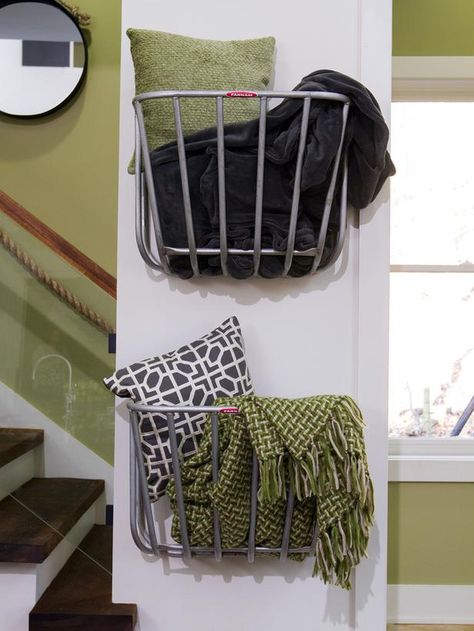 Repurposed hay-rack feeders designed for use in stable stalls are perfect in this context as simple wall-mounted storage baskets. (http://www.hgtv.com/on-tv/an-amazing-barn-conversion-from-hgtvs-elbow-room/pictures/index.html?soc=hgtvcom25992536) Blanket Storage Living Room, Basket On Wall, Hay Rack, Blanket Holder, Hay Racks, Barn Conversions, Blanket Rack, Living Room Blanket, Blanket On Wall