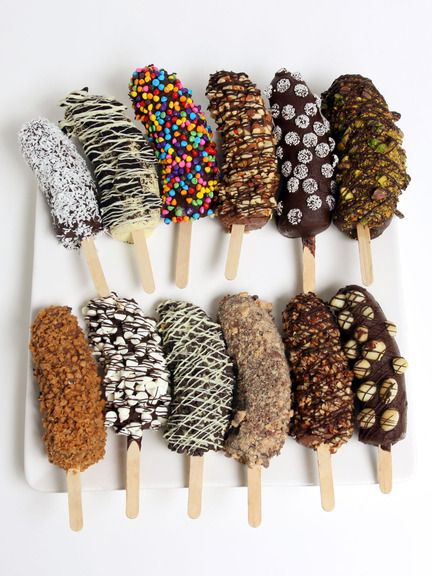 Soo getting these... | Golden Edibles - Chocolate Covered Frozen Bananas Chocolate Covered Bananas Frozen, Banana Dip, Chocolate Covered Bananas, Frozen Bananas, Dessert Aux Fruits, Chocolate Company, Summer Snacks, Frozen Treat, Curious George