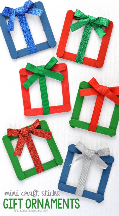 Turn your mini craft sticks into adorable little Christmas gifts ornaments for your Christmas tree. Christmas Ornament Popsicle Sticks, Christmas Activities For Kids Crafts Popsicle Sticks, Craft Stick Christmas Tree, Xmas Kids Crafts Gift Ideas, Craft Kids Christmas, Cute Christmas Ornaments Diy Kids, Diy Christmas Tree Ornaments For Kids Popsicle Sticks, Little Kid Christmas Crafts, Lollipop Stick Christmas Decorations