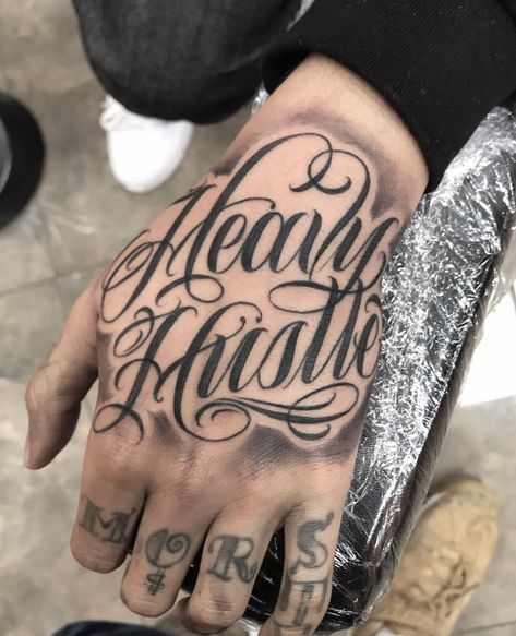 Hand Tattoo Writing Words, Hand Cursive Tattoo, Hand Name Tattoos Men, Gangsta Tattoos For Women Hand, Script On Hand Tattoo, Hand Tattoos With Names, Hand And Arm Tattoos For Guys, Guy Hand Tattoos, Hand Tattoos For Guys Ideas Design