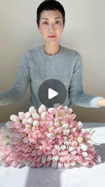 7.9K views · 1.1K likes | NYC Wedding and Events Florist on Instagram: "120 tulips in 1 vase.  Stack them neatly. Grab them carefully. Cut straight across. Tie with a clear rubber band.  Rinse. Place into a clean vase. Give it a try! 120 not necessary.   Who else is so happy it’s tulip season? #tulips #tulipseason #floristsofinstagram #floraldesign #rachelchofloral" Long Flower Table Arrangements, Tall Wedding Centerpieces Flowers, Diy Fresh Flower Bouquet, Tiny Flower Arrangements, Tulip Arrangement Ideas Floral Design, Japanese Floral Arrangements, How To Make A Flower Arrangement, Tulip Wedding Arrangements, Flower Arrangements With Tulips