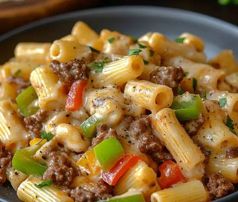 If you’re a fan of the classic Philly cheesesteak and love hearty pasta dishes, Philly Cheesesteak Pasta is the perfect fusion for your next meal. This dish takes the ... Read more Ground Beef Philly Cheese Steak Pasta, Elicoidali-pasta Recipes, Philly Cheesesteak Pasta Ground Beef, Philly Cheesecake Pasta, Crockpot Philly Cheese Steak Pasta, Easy Cooked Meals, Meal Recipes Family, Philly Cheese Steak Pasta Ground Beef, Philly Cheese Steak Salad