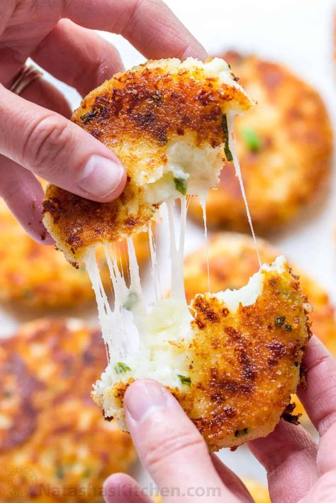 Cheesy Mashed Potato Pancakes Recipe (VIDEO) - NatashasKitchen.com Claim Jumper Potato Cakes, Cheesy Stuffed Potato Cakes, Cheesy Potato Cakes, Green Chili Cheese Potato Cakes, Cheesy Beef Stuffed Potato Cakes, Cheese Stuffed Potato Cakes, Idaho Potato Recipes, Stuffed Potato Cakes, Fried Potato Cakes