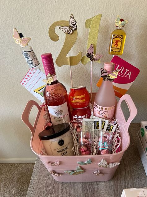 21st Birthday Gift Baskets: 25+ Unique & Thoughtful Ideas. Check it out! 18th Gift Basket, Sister 21st Birthday Gift, 21 Bday Basket, 21 Birthday Gift Basket, 21st Gift Basket Ideas, Gift Basket For Sister Birthday, Diy 21st Birthday Gifts For Her Baskets, Mom Birthday Basket Ideas, Gift Card Basket Ideas Birthday