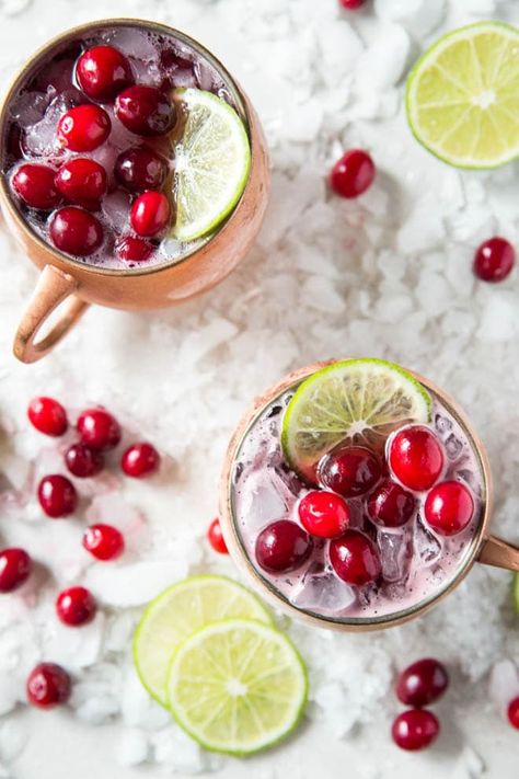 Cranberry Moscow Mule Christmas Moscow Mule, Mule Variations, Moscow Mule Variations, Moscow Mule Recipes, Cranberry Moscow Mule, Best Christmas Cocktails, Festive Holiday Cocktails, Cranberry Drinks, Best Summer Cocktails