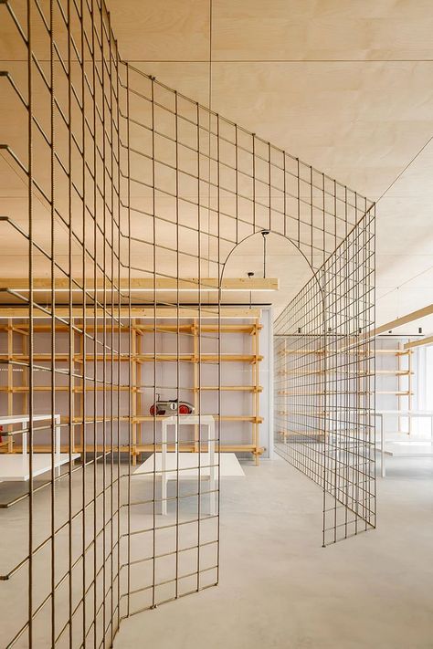 stu.dere divides its 'warehouse morinho' interior with an expressive screen Warehouse Design, Retail Interior, Light And Space, Furniture Layout, Wire Mesh, Objects Design, Retail Design, Interior Walls, 인테리어 디자인