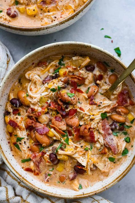 Creamy crack chicken chili is an explosion of irresistible flavors! It's loaded with shredded chicken, tender beans, corn, AND all your favorite crack-inspired ingredients. This is our new favorite chili recipe and we can't get enough of it! Chilli Recipe Chicken, Best Freezer Soups, Chicken Chilli In Crock Pot, Recipe Critic Recipes, Chicken Chili Instant Pot, Crock Pot Chicken Chili, Creamy Chicken Chili, Chicken Chili Crockpot, Favorite Chili Recipe