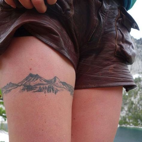 Elevate your style with mountain tattoos. In this article, we will share the best designs from geometric lines to realistic depictions. Floral Upper Leg Tattoo, Coverup Tattoo Wrist, Mountains Back Tattoo, Connector Tattoos, Bicep Filler Tattoo, Men Mountain Tattoo, Nature Arm Band Tattoo, Mountain Tattoo Women, Complicated Tattoos