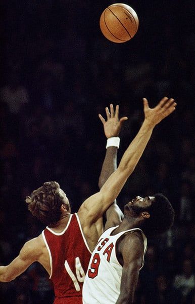 The 1972 men's Olympic basketball final in Munich was a sporting battle between the Cold War superpowers. The USA were unbeaten in the Olympics and were outright favourites going into the match. When Dwight Jones and Alexsander Belov tipped off (pictured), few could have imagined the drama that would ensue at the Rudii Sedlmayer Halle Photograph: Tony Duffy/Getty Images Basketball Slogans, Sports Slogans, Wrestling Quotes, Basketball Scoreboard, Olympic Basketball, Basketball Tricks, Fantasy Basketball, Basketball Tips, Sports Pictures