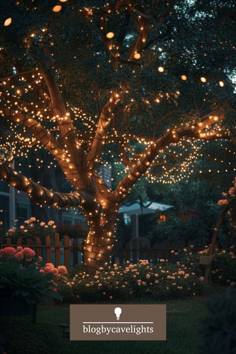 Elevate your garden design with stunning garden tree lights 🌿. Our step-by-step guide will help you get it right! Read the full article now! Willow Tree Christmas Lights, Christmas Lights Hanging From Trees, Lights In Trees For Wedding, Wrapped Trees With Lights, Garden Tree Lights, Light Up Trees Indoor, Wedding Trees With Lights, Christmas Lights Outside Trees, Outdoor Christmas Lights Tree