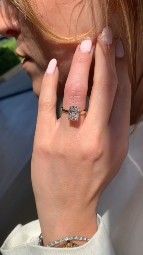 Make a lasting impression with our 2 Carat Elongated Cushion Cut Minimalist Engagement Ring. Featuring a hidden halo and a lab-grown diamond cushion, this exquisite wedding ring is a perfect push present for her. Its minimalist design adds a touch of elegance to any occasion. Shop now 𝐅𝐞𝐚𝐭𝐮𝐫𝐞𝐬:• 𝐌𝐚𝐝𝐞 𝐭𝐨 𝐎𝐫𝐝𝐞𝐫• 𝐌𝐞𝐭𝐚𝐥: 𝟏𝟒𝐊 𝐆𝐨𝐥𝐝 | 𝟏𝟖𝐊 𝐆𝐨𝐥𝐝 | 𝟗𝟓𝟎 𝐏𝐥𝐚𝐭𝐢𝐧𝐮𝐦• 𝐁𝐚𝐧𝐝 𝐂𝐨𝐥𝐨𝐫𝐬: Rose Gold, Yellow Gold & White Gold 𝐂𝐞𝐧𝐭𝐞𝐫 𝐬𝐭𝐨𝐧𝐞:• 𝐒𝐭𝐨𝐧𝐞 Wedding Band With Cushion Engagement Ring, Cushion Engagement Ring 2 Carat, Cushion Vs Oval Engagement Ring, 2 Carat Elongated Cushion Cut, Classy Engagement Ring Cushion, Emerald Cushion Engagement Ring, Extended Cushion Engagement Ring, 1.5 Carat Elongated Cushion, Elongated Cushion Cut Engagement Rings