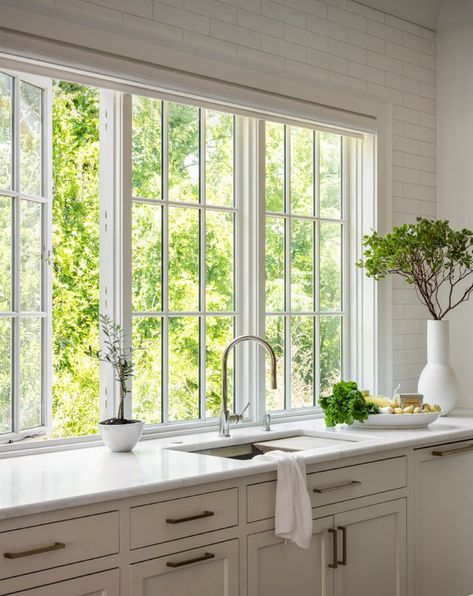 Kitchen With Windows Beside Range, Window Trim Kitchen Sink, French Windows Kitchen, Kitchen Cased Opening, Picture Window Above Kitchen Sink, Kitchen Casement Windows Over Sink, Oven Between Two Windows, Kitchens With Large Windows, Kitchen With Windows No Upper Cabinets