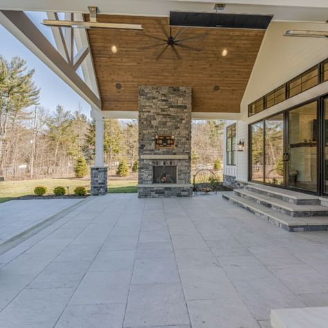 Covered Patio | Are you ready for summer gatherings in endless comfort? Enjoy the perfect indoor / outdoor living space with this covered patio. Large glass sliding doors connected to the house, a fireplace and built-in grill. 

Call to inquire about your dream home project! We still have room in our schedule this season. 
Call us at 440-543-3333  
-
-
-
-
-
#ohiocustomhomes #clevelandbuilders #oterohomescle #luxuryhomes #luxurycustomhomes #indoor #outdoor #patio #fireplace Outside Patio With Fireplace, Outdoor Patio With Grill And Fireplace, Covered Deck With Outdoor Kitchen, Covered Patio With Fireplace And Kitchen, Vaulted Outdoor Patio, Covered Patio Off House, Vaulted Ceiling Outdoor Patio, Back Porch Add On Covered Patios, Outdoor Covered Patio Ideas With Fireplace