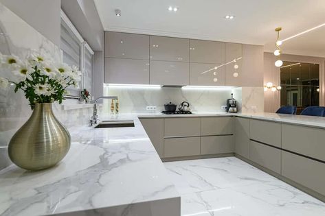 Marble kitchen ideas are timeless, beautiful, and still extremely popular. The advantages of marble as a building material include its hardness, its extraordinary, polished finish, its natural textures, plus the... The post 5 Clever Ways to Introduce Marble into Your Kitchen appeared first on Rachel Bustin. Slab Kitchen Cabinets, Dark Brown Kitchen Cabinets, Modern Kitchen Design Trends, Kitchen Slab, European Kitchen Cabinets, Brown Kitchen Cabinets, Серая Кухня, Frameless Cabinets, European Kitchens