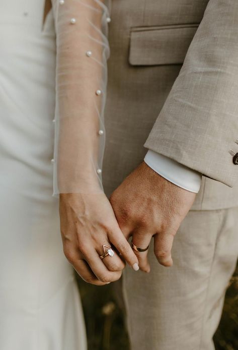 Close up of wedding couples hands with wedding rings on in mitchells meadows Wedding Photo Ring, Hand Holding Wedding Photo, Wedding Photos Rings Hands, Wedding Ring Shots Creative, Wedding Band Pictures, Bride And Groom Hand Pictures, Holding Hands Wedding Rings, Bride And Groom Close Up, Up Close Wedding Photos