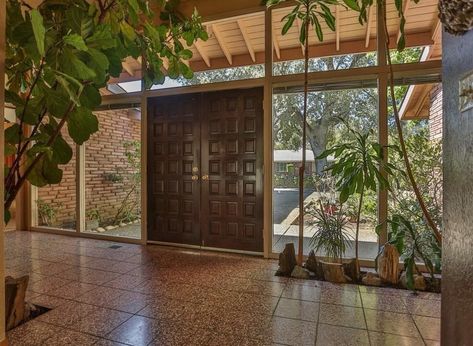 70s Atrium House, Mid Century Modern House Exterior Ranch Style, Mid Century Modern Layout, Mcm Wood Floors, 70s Ranch Style Homes, 70s Entryway, Modern 70s House, Retro House Exterior, 70s House Aesthetic