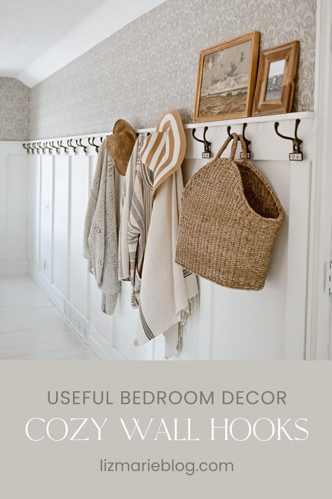 Useful bedroom decor with cozy vintage wall hooks. Bedroom Hooks Ideas, Guest Room Wall Hooks, Hooks Bedroom Wall, Shelf With Hooks Bedroom, Closet Wall Hook Ideas, Hook Decorating Ideas, Bedroom Hooks On Wall For Clothes, Hooks On Wall Bedroom, Hooks On Bedroom Wall