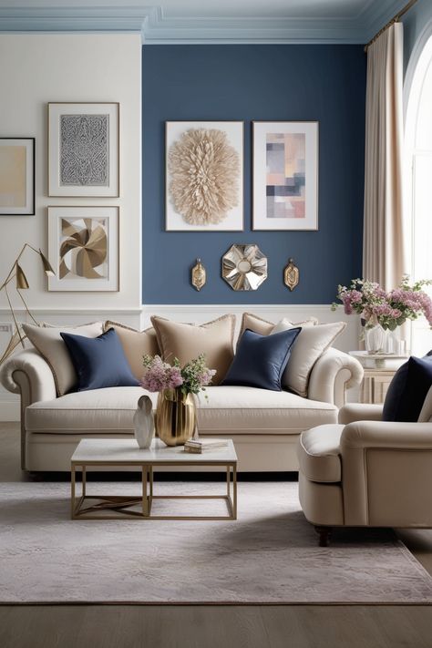 Explore the perfect blend of coziness and elegance in this beautifully designed living room. Featuring soft white, light blue, and navy wall colors, this space showcases a big, stylish beige sofa paired with a unique coffee table. #CozyLivingRoom #ElegantInteriors #HomeDecorIdeas #InteriorDesign #EdisonBulbs #UrbanArt #TexturedDecor #IndoorPlants #LivingRoomStyle #SoftPalette #LivingRoom Blue Gold And Cream Living Room, Navy Blue And Taupe Living Room, Dark Blue And Cream Living Room, Living Room Trends 2025 Interior Design, Taupe And Blue Living Room, Navy And Beige Living Room, Grey Living Room Ideas With Pop Of Color, Beige Sofa Living Room Color Schemes, Blue Couch Living Room Colour Schemes