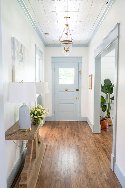 Historic Home Renovation - Home Tour - Farmhouse Living - Gold Pendant Light - Shiplap Ceiling - Sleepy Blue Trim - Blue Painted Front Door - Entry Way Inspiration - Hardwood Floors White Blue Wall Paint, Blue Ceiling Entryway, Blue Trim Living Room, Blue Interior Trim And Doors, White Walls Blue Trim Bathroom, Light Color Home Interior Design, Blue Contrast Trim Interior, White Wall Blue Trim, Light Blue Foyer