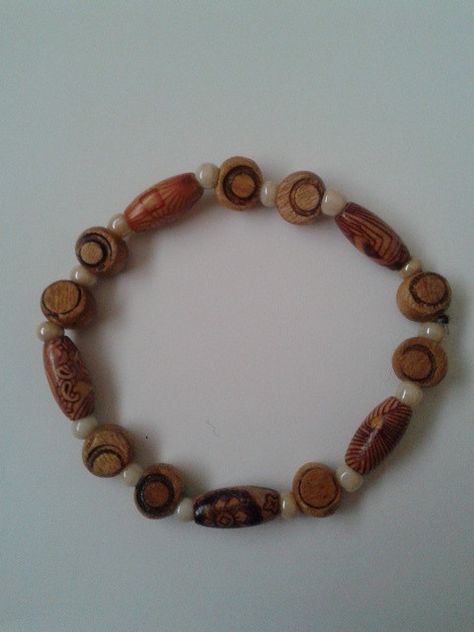 Upcycled Bracelet  •  Make a beaded bracelet in under 5 minutes Make A Beaded Bracelet, Wooden Bead Bracelet, Circle Bracelet, Beach Bracelets, Boho Bracelets, Bead Bracelet, Wooden Beads, Bracelet Making, Beaded Bracelet