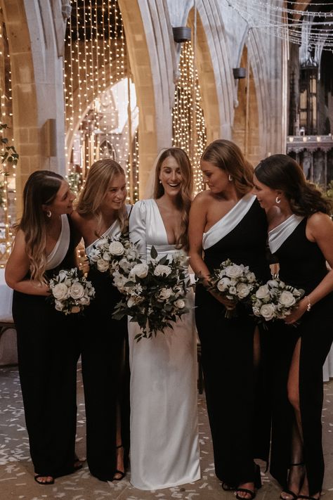 Black And Grey Bridesmaid Dresses, 1 Bridesmaid Wedding, Dark Wedding Aesthetic Bridesmaids, Black White Bridesmaid Dresses, Flowers For Black Bridesmaid Dresses, New Years Eve Wedding Bridesmaid Dresses, White And Black Bridesmaid Dresses, Black Tie Wedding Colors, Nye Bridesmaid Dresses