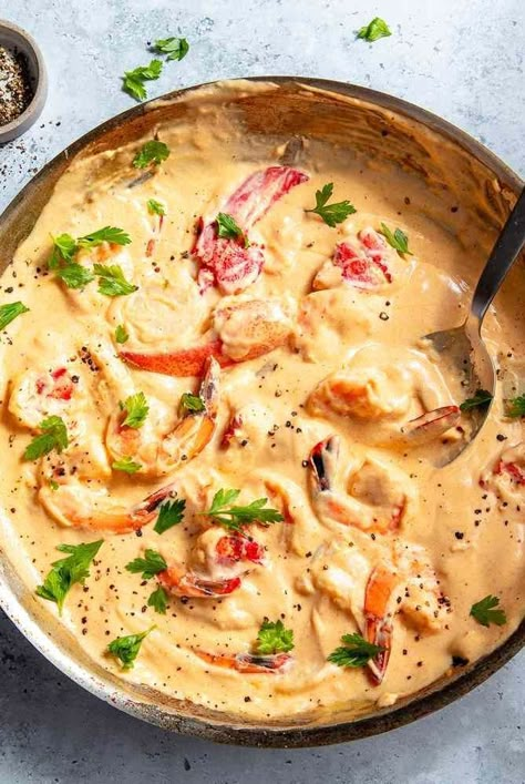 This Seafood Newburg recipe includes lobster, shrimp, scallops, and fish (haddock or hake fillets) simmered in a rich sherry-spiked cream sauce for a decadent retro dinner meal that also happens to be fast and easy. Seafood Newburg Recipe, Seafood Newburg, Lobster Newburg, Haddock Recipes, Seafood Dish Recipes, Shrimp Scallops, Seafood Sauce, Scallop Recipes, Lobster Recipes