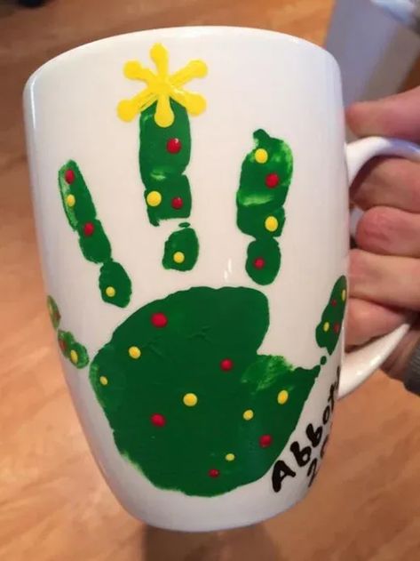 50+ Adorable DIY Christmas Gifts for Grandparents To Melt Their Hearts | HubPages Infant Holiday Gifts For Parents, Handprint Gifts For Grandparents Christmas, Infant Keepsake Ideas, Christmas Mug Crafts For Kids, Baby Christmas Gifts For Parents, Christmas Handprint Mug, Gifts For Parents From Kids Christmas, Diy Christmas Mugs Kids, Parent Gifts Preschool Christmas