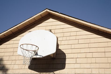 How to Attach a Basketball Backboard to a Wall Basketball Installation, Basketball Apparel, Louisville Basketball, Basketball Information, Basketball Rim, Basketball Tricks, Portable Basketball Hoop, Basketball T Shirt Designs, Basketball Backboard