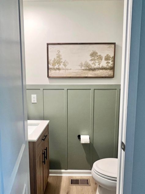 Half Walls In Bathrooms, Waterproof Wainscoting Bathroom, Bathroom Vertical Paneling, Types Of Wainscoting Bathroom, Paneling In Powder Room, Bathroom Remodel Green Walls, Small Bathroom Wood Panelling, Bathroom Half Panel Wall, Half Bath Paneling