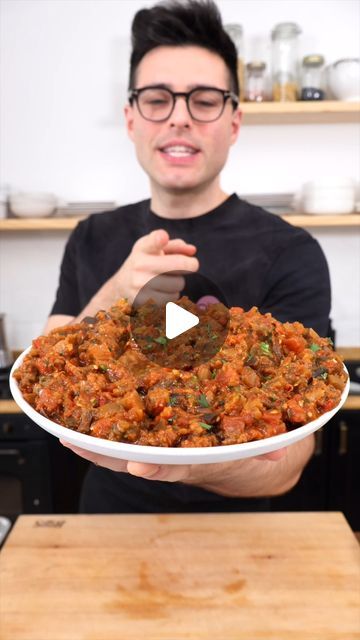 Nico Pallotta on Instagram: "EGGPLANT ZAALOUK 🍆 Zaalouk is a traditional Moroccan salad and dip where diced eggplants are cooked in a tasty sauce of tomatoes, garlic, paprika, and cumin. It’s served as an appetizer or side dish with warm crusty bread or as a main dish with other spreads and dips. You’ll love Zaalouk’s creamy yet chunky texture and rich, aromatic, slightly smokey, and savory taste. The recipe is easy to make in one skillet in less than 30 minutes and perfect for meal prep. GET RECIPE: https://theplantbasedschool.com/zaalouk/ Enjoy! Nico and Louise #eggplantrecipe #zaalouk #sidedish ##mediterraneancuisine #mezzeplatter" Zalook Dip, Moroccan Eggplant Recipes, Eggplant Stew Recipes, Eggplant Appetizer Recipes, Zaalouk Recipe, Spreads And Dips, Eggplant Appetizer, Eggplant Meatballs, Moroccan Salad