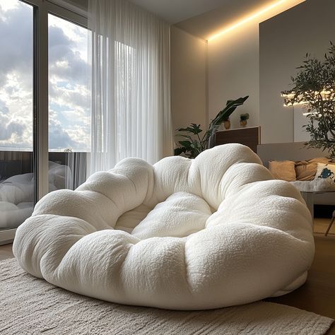 The Cloud Bean Bag is a plush, cloud-shaped seat that brings ultimate comfort and relaxation to any space. Designed to resemble a soft, fluffy cloud, its rounded, gentle contours and cushioned form cradle your body, offering a cozy place to lounge. Made from premium, breathable fabric and filled with high-density foam, this bean bag molds to your shape, providing ergonomic support. Perfect for reading, napping, or simply unwinding, the Cloud Bean Bag adds a whimsical, nature-inspired touch to... Crochet Bean Bag Chair, Huge Bean Bag Bed, Bean Bag Ideas, Big Beanbag, Fluffy Bean Bag, Huge Bean Bag Chair, Fluffy Bean Bag Chair, Fluffy Chair, Giant Bean Bag