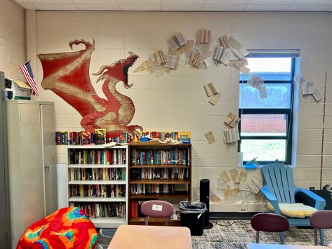 The Hobbit Classroom Decor, Fantasy Book Display Library, Library Board Decoration Ideas, Reading Themed Classroom, High School Library Decor, Library Themes Elementary, Fantasy Themed Classroom, Hobbit Classroom Theme, Dragon Classroom Theme