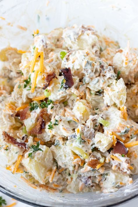 This Loaded Baked Potato Salad Recipe has all the great baked potato topping combined into a flavorful potato salad. Cheese, bacon, sour cream and green onions make this a truly unforgettable side dish. #sidedishrecipes #potatosaladrecipes #loadedpotatosalad Loaded Baked Potato Salad Recipe, Sour Cream Potato Salad, Baked Potato Salad Recipe, Best Twice Baked Potatoes, Potato Salad With Apples, Loaded Potato Salad, Baked Potato Toppings, Easy Baked Potato, Loaded Baked Potato Salad