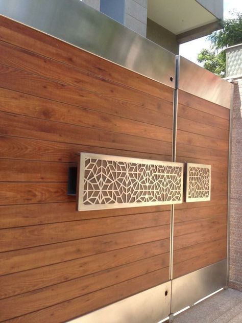 Crafting Elegance with Main Gate Designs Main Gate Modern Design, Wooden Gates Ideas Entrance, Gate For House Entrance, Gate Iron Design, Entrance Gates Design Modern, Door Design Modern Indian, Compound Wall Grill Design, Front Gate Design Modern Steel, Ss Main Gate Design